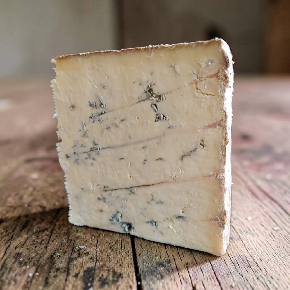 Comprar queso Stilton Colston Bassett - mejor queso azul inglés, Neal's Yard Dairy, pinchado a mano
