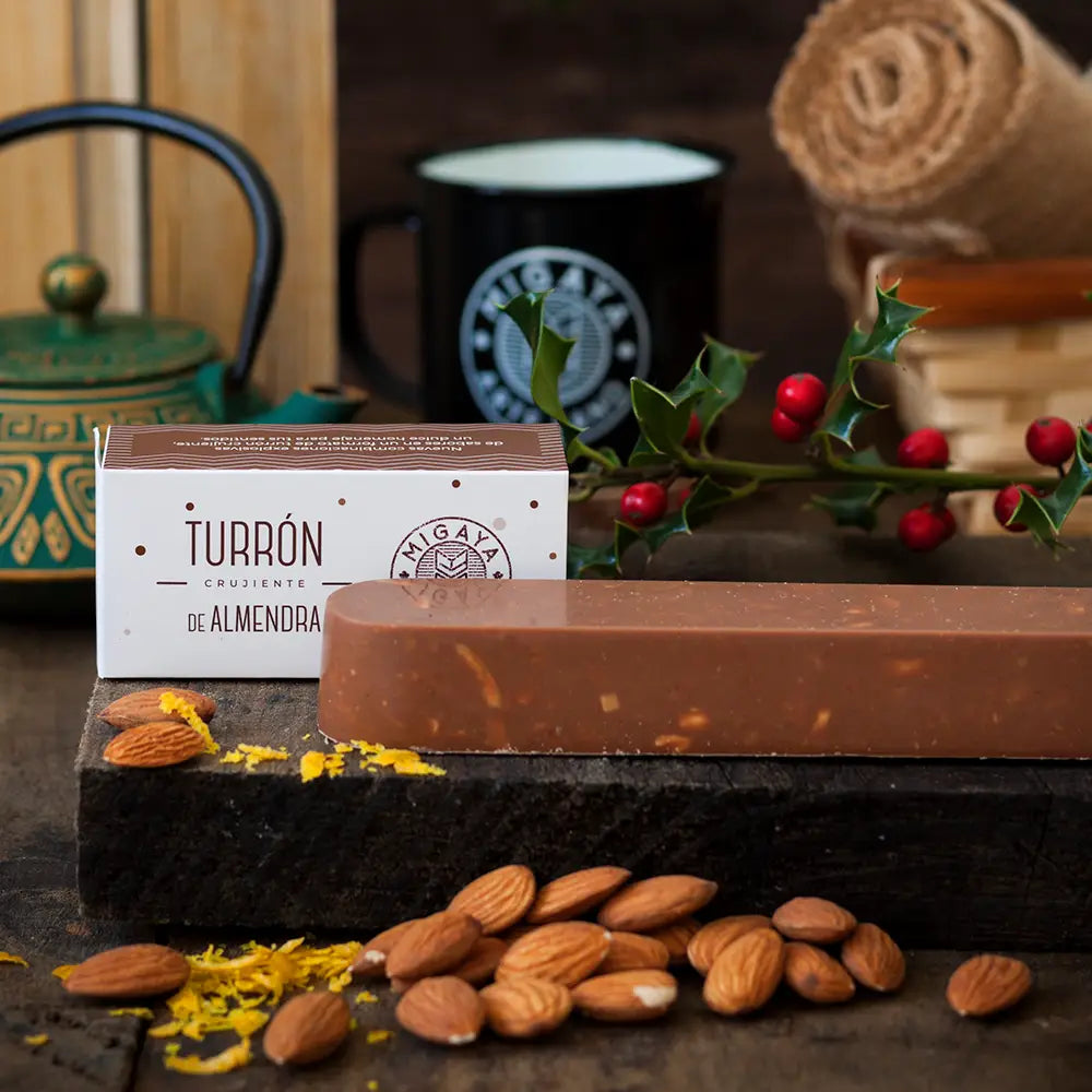 Turrón de almendra Migaya - chocolate con leche, palitos de almendra, galleta y piel de naranja